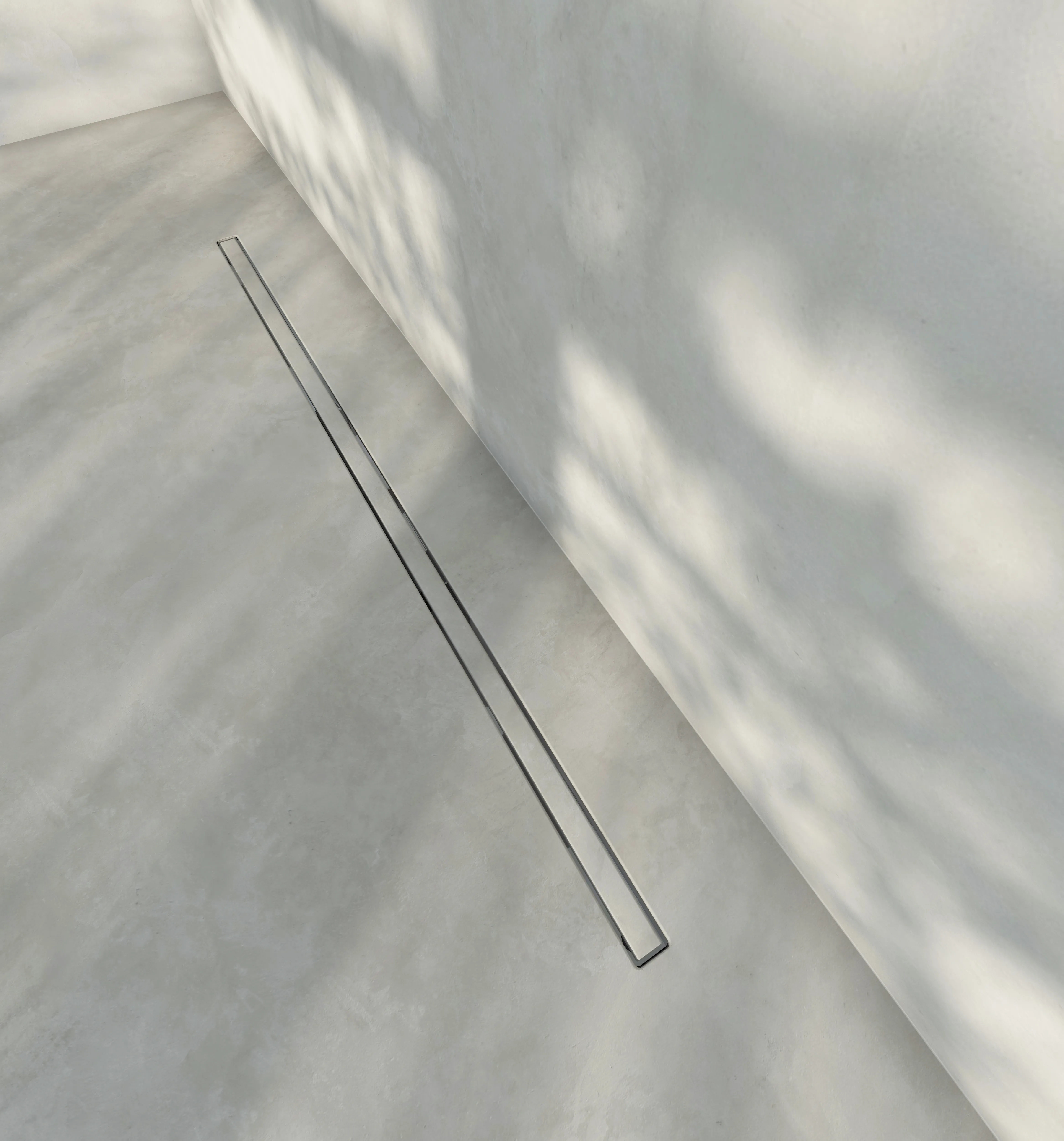 Micro Line shower drain in microcement